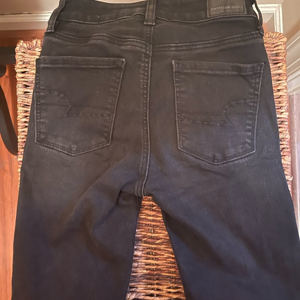 Black distressed skinny jeans size 0 long. By American Eagle